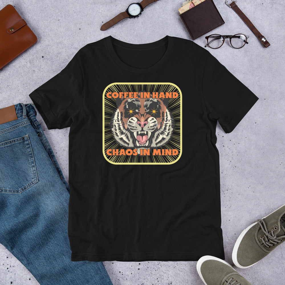 Black t-shirt with slogan coffee in hand chaos in mind. Vintage style roaring tiger head, comic book aesthetic